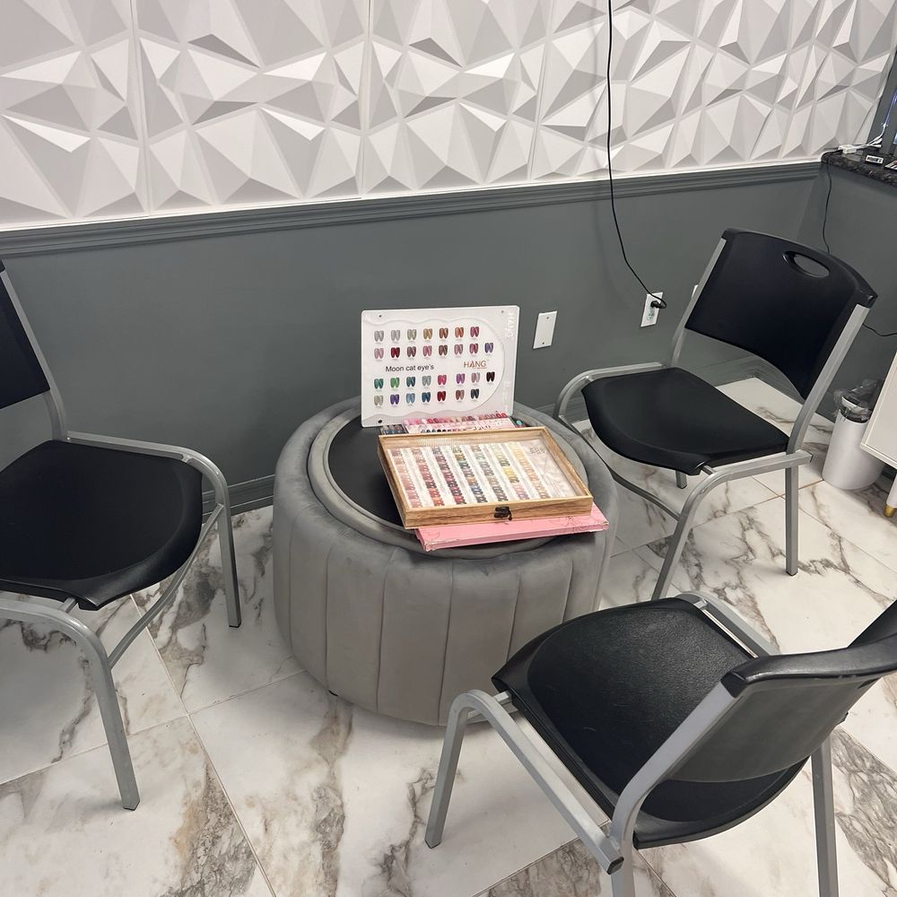 Orchid Nails & Spa - The colors are in cute books and a display case - Nail Salons Near Me - Winter Park, Florida Orchid Nails & Spa - The colors are in cute books and a display case - Nail Salons Near Me - Winter Park, Florida
