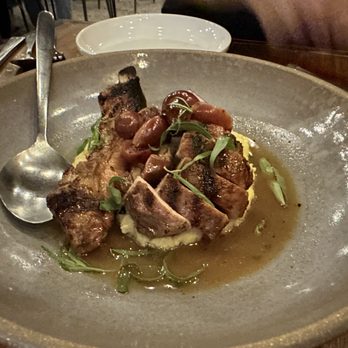 Intero Restaurant - Slow roasted porchetta, cambozola polenta, roasted grape, tarragon - Italian Near Me - Austin, Texas