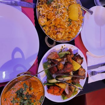 Taste of India - various dishes of food on a table - Indian Near Me - Brookfield, Wisconsin