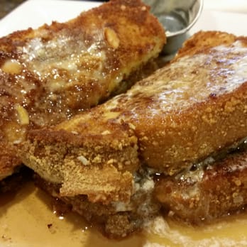 Le Rendez-Vous Cafe - French toast with almond graham cracker crust, stuffed with marscapone cheese. - Diners Near Me - Lake Elsinore, California Le Rendez-Vous Cafe - French toast with almond graham cracker crust, stuffed with marscapone cheese. - Diners Near Me - Lake Elsinore, California