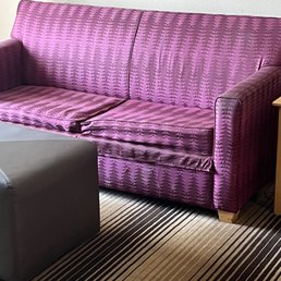 This is the couch you would find along the road This is the couch you would find along the road