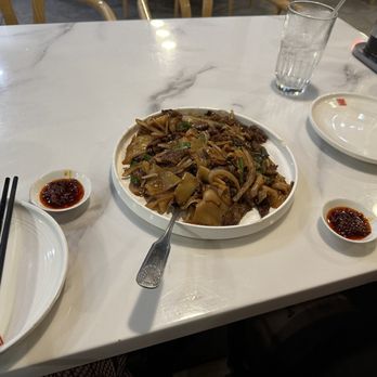 Dumpling House - Generous beef in these wide noodles (Cm06. Stir-Fried Rice Noodles With Beef) - Chinese Near Me - Frisco, Texas