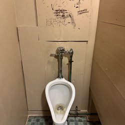 L&M Lanes - Urinal that's been through some things