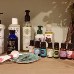 A lovely collection of essential oils, arnica oil, jojoba oil, etc.