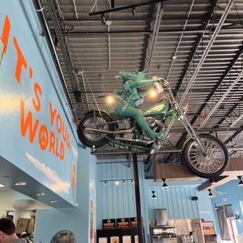 Freebirds World Burrito - a motorcycle suspended from the ceiling - Mexican Near Me - Denton, Texas