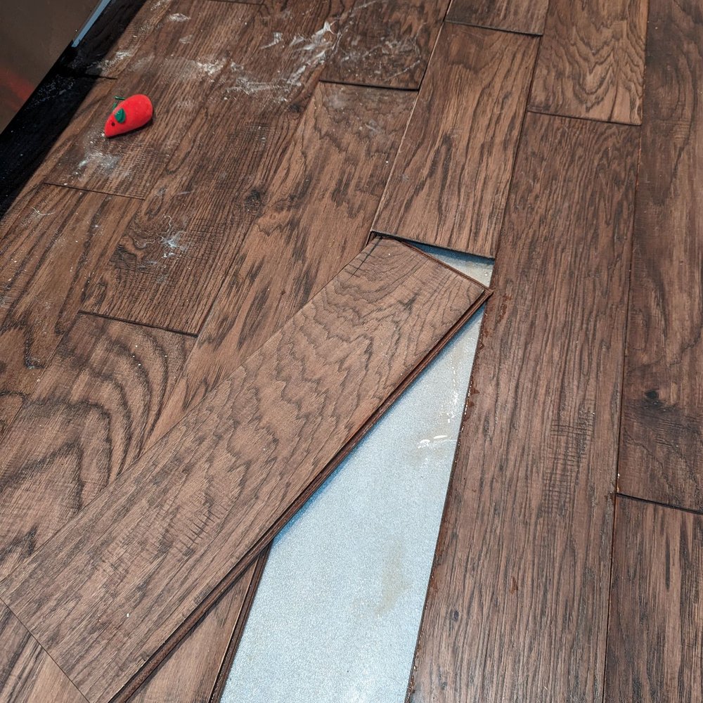 High Fidelity Property Management - Floorboards coming off of floor from water damage - Property Management Near Me - Chicago, Illinois High Fidelity Property Management - Floorboards coming off of floor from water damage - Property Management Near Me - Chicago, Illinois