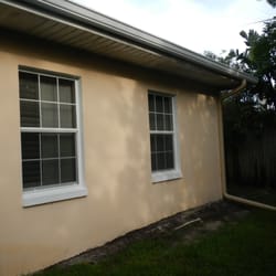 Krown Service LLC - Back of room addition before repair and stucco