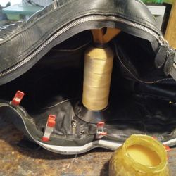 Ms Gwenneth - Replaced a zipper in a sling bag