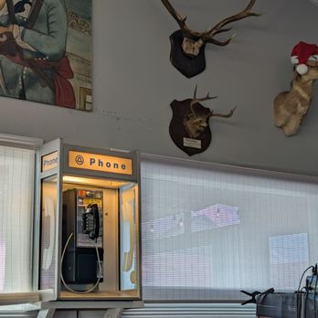 Watermen's Bar and Grill - Old phone with some antlers - Bars Near Me - Waves, North Carolina Watermen's Bar and Grill - Old phone with some antlers - Bars Near Me - Waves, North Carolina