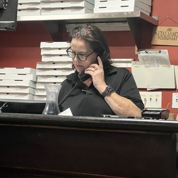 Italiano's Restaurant - Miss Christina taking orders - Italian Near Me - Atascocita, Texas