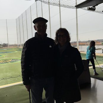 Topgolf - Dad and I, with the range behind us. - New American Near Me - Greenville, South Carolina Topgolf - Dad and I, with the range behind us. - New American Near Me - Greenville, South Carolina