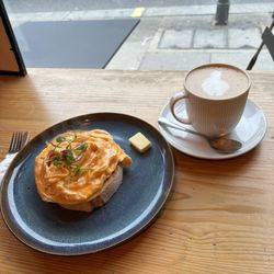Bonjour Brioche - Eggs on sourdough with a caffe latte. Delicious!!