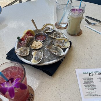Beach House - Oysters with a pina colada and "the bouquet" - Bars Near Me - Pompano Beach, Florida