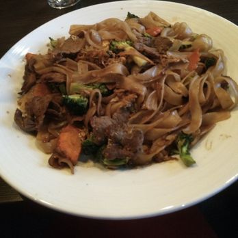 The Spice - a plate of noodles with meat and vegetables - Thai Near Me - Ames, Iowa