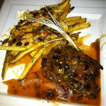 Todd's Unique Dining - Fiery skirt steak with chili cheese fries - Seafood Near Me - Henderson, Nevada Todd's Unique Dining - Fiery skirt steak with chili cheese fries - Seafood Near Me - Henderson, Nevada