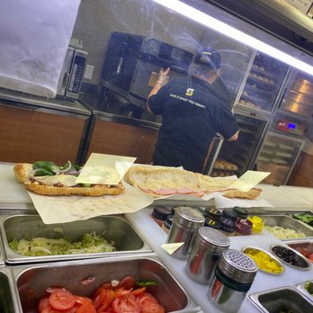 Subway - a counter with a variety of food items - Fast Food Near Me - Coldspring, Texas Subway - a counter with a variety of food items - Fast Food Near Me - Coldspring, Texas
