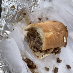 Cheesesteak with onions & hot peppers. Cheesesteak with onions & hot peppers.