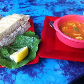 The Lighthouse Grill - Tuna salad sandwich with apples and olives on focaccia with tomato tortellini soup. - American Near Me - Trinidad, California The Lighthouse Grill - Tuna salad sandwich with apples and olives on focaccia with tomato tortellini soup. - American Near Me - Trinidad, California