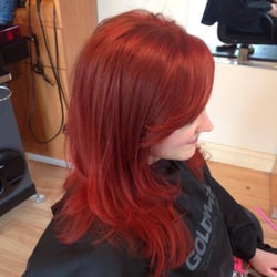 Kiara Mooney Salon & Spa - Kiara, owner, used the Goldwell RO MAX series to create this beautiful red orange.
