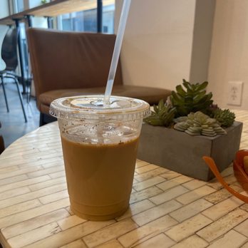 Concord Coffee - Iced latte with oat milk and cinnamon - Coffee & Tea Near Me - Lakeland, Florida