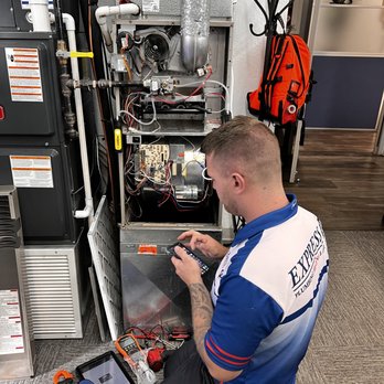 Express Plumbing Heating & Air - Repairing the furnace with quality parts. - Plumbing Near Me - Boise, Idaho Express Plumbing Heating & Air - Repairing the furnace with quality parts. - Plumbing Near Me - Boise, Idaho