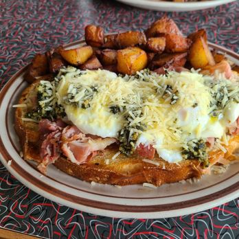 Triangle Diner - Chef's Choice - poached eggs on mozzarella, prosciutto, & garlic bread w/ cashew pesto, parmesan & home fries. - Diners Near Me - Saratoga Springs, New York Triangle Diner - Chef's Choice - poached eggs on mozzarella, prosciutto, & garlic bread w/ cashew pesto, parmesan & home fries. - Diners Near Me - Saratoga Springs, New York