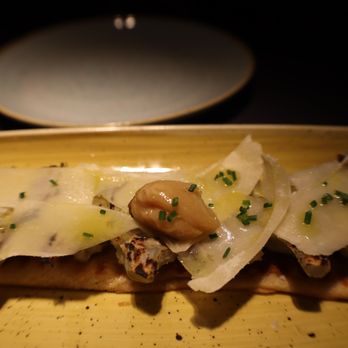 Juana la Loca - AMAZING! Grilled artichokes, shaved parmesan & confit garlic cloves on tender bread - Tapas/Small Plates Near Me - Madrid, M Juana la Loca - AMAZING! Grilled artichokes, shaved parmesan & confit garlic cloves on tender bread - Tapas/Small Plates Near Me - Madrid, M
