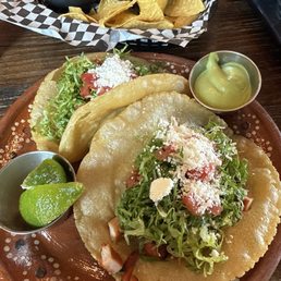 Puffy chicken taco special (fried corn tortillas). Small side of guac. Puffy chicken taco special (fried corn tortillas). Small side of guac.