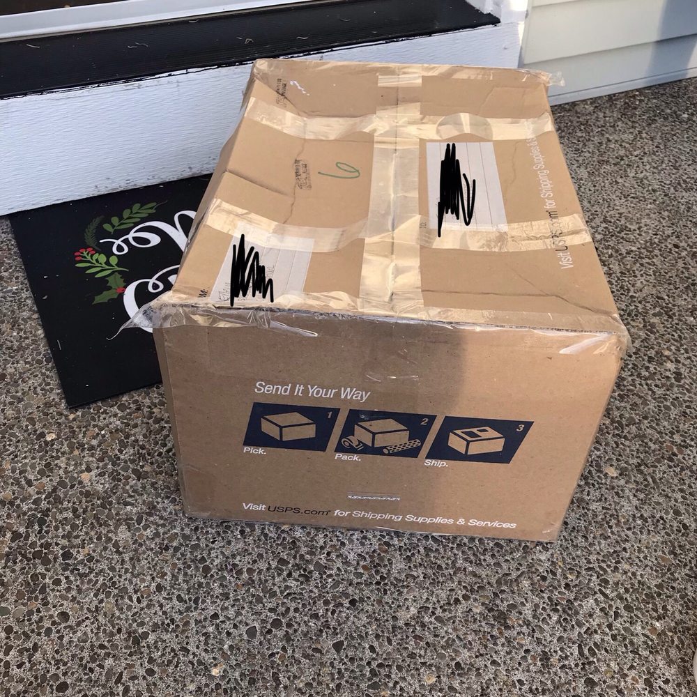 US Post Office - Days later on my porch, with an almost open box - Post Offices Near Me - Tualatin, Oregon