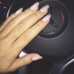 Just got my acrylics done by Tina. Exactly how I wanted it-she does amazing work and provides exceptional customer service!