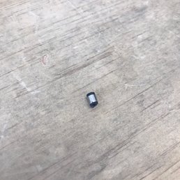 Piece of the charger that broke inside of laptop