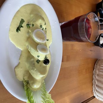 Mi Lindo Perú - Boiled potatoes in sauce called - Papa a La Huancaina with a Peruvian juice called chicha morada made from purple corn. - Peruvian Near Me - San Francisco, California Mi Lindo Perú - Boiled potatoes in sauce called - Papa a La Huancaina with a Peruvian juice called chicha morada made from purple corn. - Peruvian Near Me - San Francisco, California