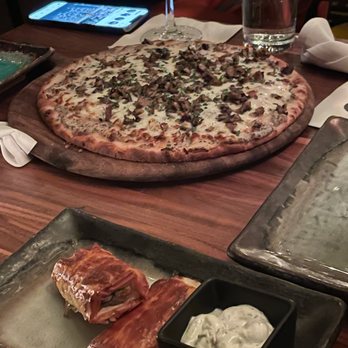 Pergola - Mushroom truffle pizza FRY GOAT CHEESE POPPERS - Hookah Bars Near Me - New York, New York Pergola - Mushroom truffle pizza FRY GOAT CHEESE POPPERS - Hookah Bars Near Me - New York, New York