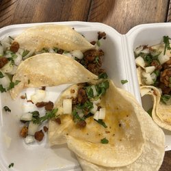 Garcia's Tamales And Tacos - No meat in a taco, shrimp cocktail in watery sauce.