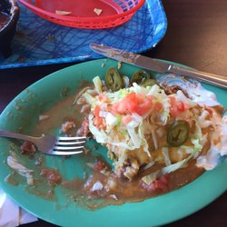 Half eaten and still bigger than my head! The smothered wet burrito is great! Eat here
