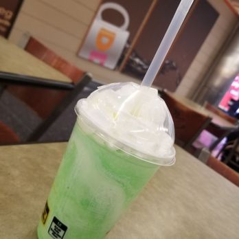 McDonald's - a green drink in a plastic cup - Coffee & Tea Near Me - Chicago, Illinois McDonald's - a green drink in a plastic cup - Coffee & Tea Near Me - Chicago, Illinois