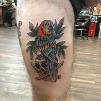 Peacemaker Tattoo Company - Perched parrot on a skull tattoo - Tattoo Near Me - Jonestown, Texas Peacemaker Tattoo Company - Perched parrot on a skull tattoo - Tattoo Near Me - Jonestown, Texas
