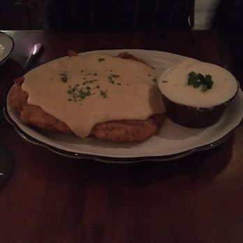 Moonshine Grill - Chicken fried steak with grits - Southern Near Me - Austin, Texas Moonshine Grill - Chicken fried steak with grits - Southern Near Me - Austin, Texas