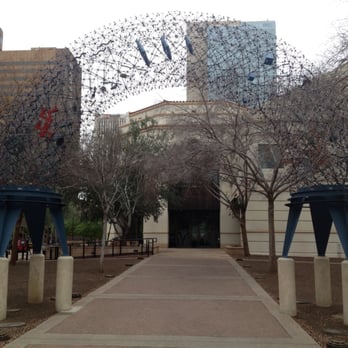 Herberger Theater Center - Artistic courtyard arch on a rare day of cloudiness in Phoenix. - Performing Arts Near Me - Phoenix, Arizona