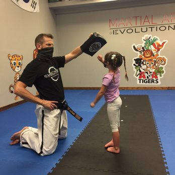 Evolution Training Center - Her introductory lesson - Martial Arts Near Me - Manhattan, Kansas Evolution Training Center - Her introductory lesson - Martial Arts Near Me - Manhattan, Kansas