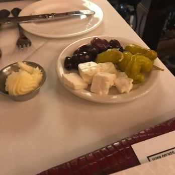Buffalo Chophouse - Bread (not in the picture) butter, cheese, olives and peppers on the house - Steakhouses Near Me - Buffalo, New York Buffalo Chophouse - Bread (not in the picture) butter, cheese, olives and peppers on the house - Steakhouses Near Me - Buffalo, New York