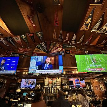 The Garrison Restaurant and Bar - TV's and pennants and the bar - Bars Near Me - Lake George, New York The Garrison Restaurant and Bar - TV's and pennants and the bar - Bars Near Me - Lake George, New York