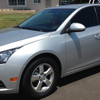 Astro Eclipse Custom Glass Tinting - Excellent tint job. Medium on the front two windows and Dark on the back section. - Home Window Tinting Near Me - Placentia, California