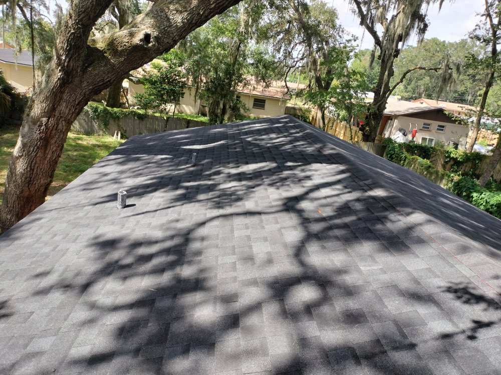 Slide of Land Roofing Company