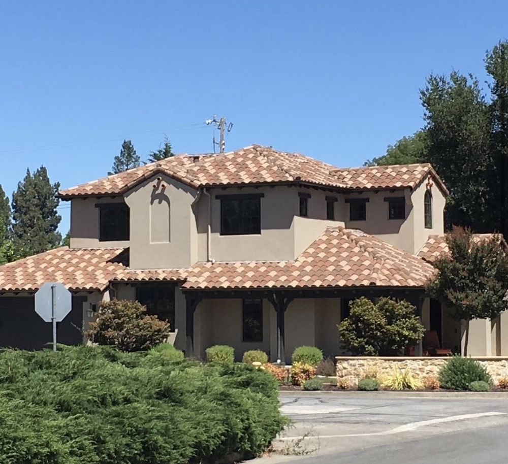 Slide of Exclusively Roofing