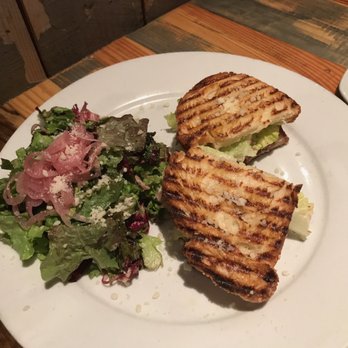 Vero Pizzeria - Panini with oak roasted chicken, romaine, Parmesan dressing, and tapenade on Semolina bread - Italian Near Me - Atlanta, Georgia Vero Pizzeria - Panini with oak roasted chicken, romaine, Parmesan dressing, and tapenade on Semolina bread - Italian Near Me - Atlanta, Georgia
