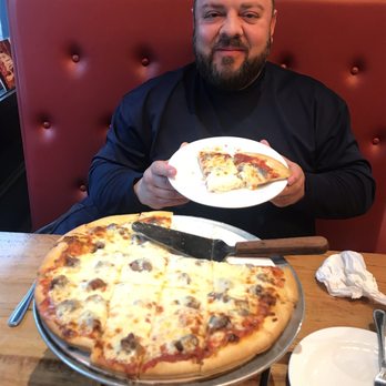 Giordano's - Happy Hubby with his thin crust pizza. - Pizza Near Me - Chicago, Illinois