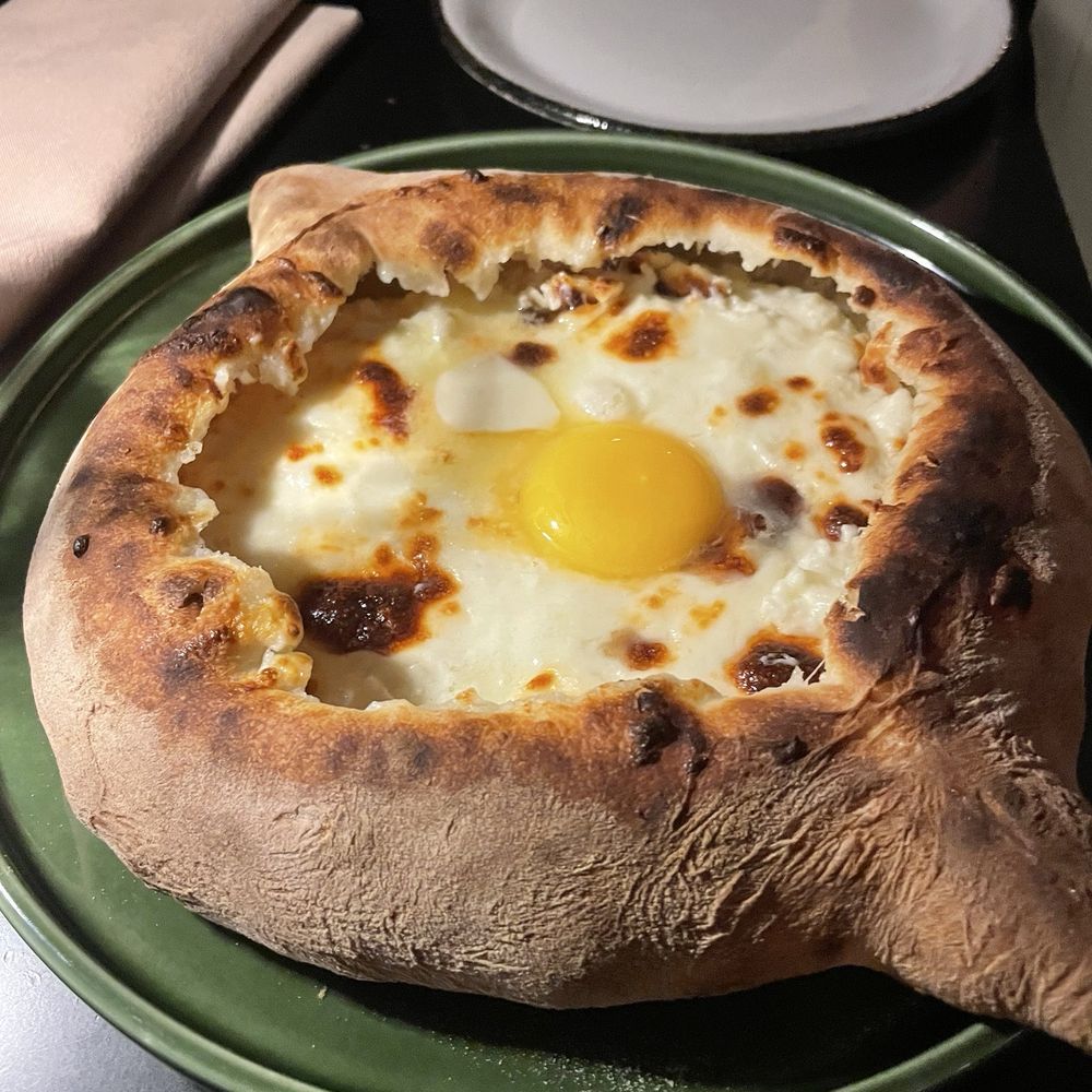 Laliko - Khachapuri with egg yolk, initial presentation. Beautiful! - Georgian Near Me - New York, New York Laliko - Khachapuri with egg yolk, initial presentation. Beautiful! - Georgian Near Me - New York, New York
