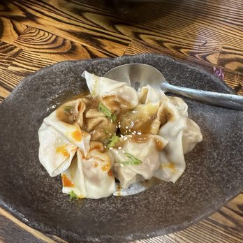 Dumpling Home - Pork Dumplings with Sesame Sauce and Red Chili Oil - Dim Sum Near Me - San Francisco, California Dumpling Home - Pork Dumplings with Sesame Sauce and Red Chili Oil - Dim Sum Near Me - San Francisco, California