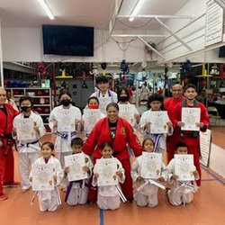 Navarro's Kenpo Karate & Martial Arts Academy - Smiling students passed their tests and received new ranks!